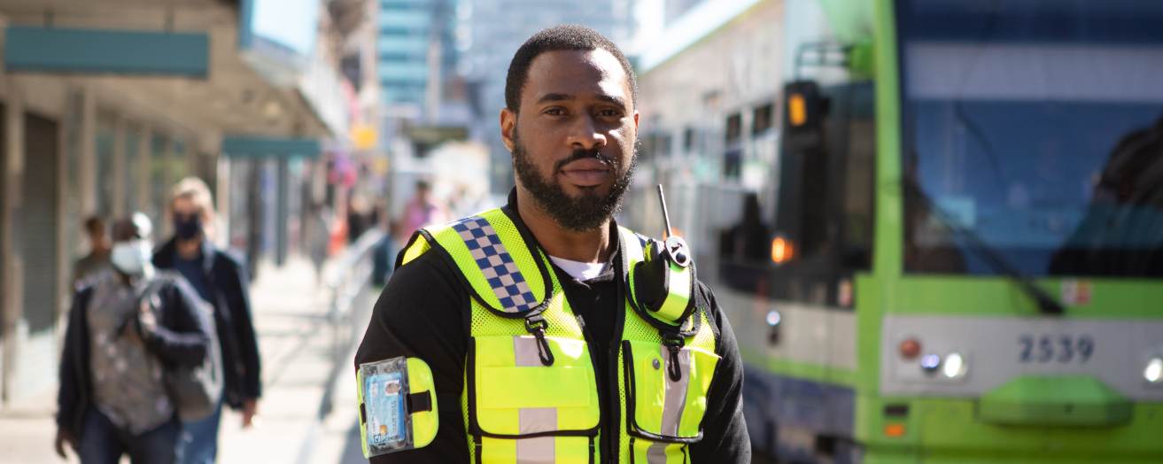 a security officer wearing his SIA badge while on duty